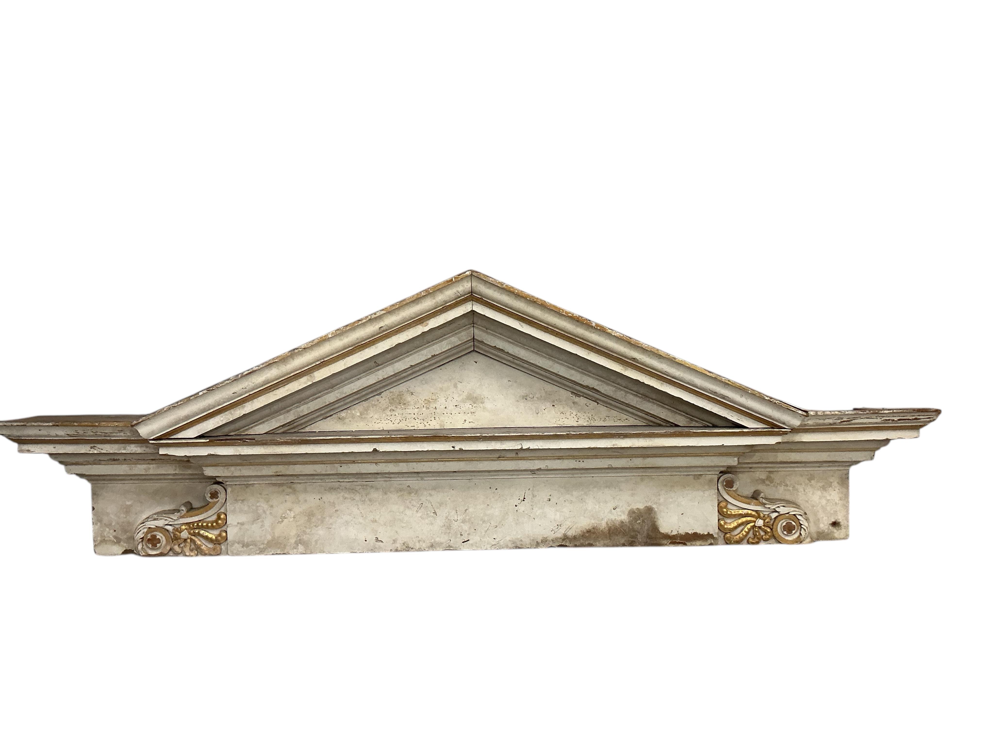 A large late 18th century painted parcel gilt pine door surround, width 154cm, height approximately 266cm